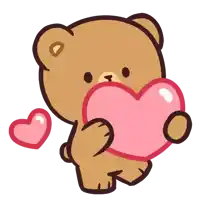 a brown teddy bear is holding a pink heart