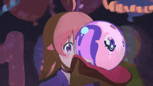 a pixel art drawing of a girl holding a pink ball with a dolphin on it