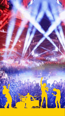 a crowd of people are watching a band perform on stage