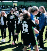 a soccer player with the number 13 on the back