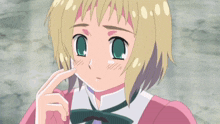a girl with blonde hair and green eyes is wearing a pink dress and bow tie