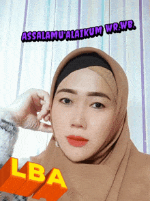 a woman wearing a hijab with the words assalamu ' alaikum wr.wb. behind her