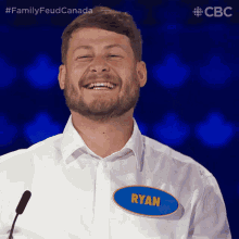 a man with the name ryan on his shirt