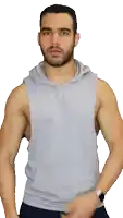 a man with a beard is wearing a sleeveless hoodie