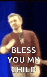 a blurry picture of a man with the words bless you my child on the bottom