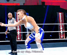a wrestler says get in my ring princess in front of a referee