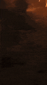 a painting of a sunset with a lot of fire falling from the sky