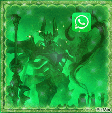 a green background with a picture of a monster and a whatsapp icon