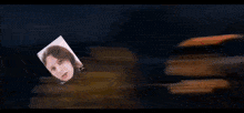 shrek is dancing with a picture of a woman on his back .