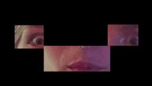 a close up of a person 's face is displayed on a black screen