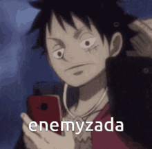 a monkey d luffy from one piece is looking at his phone with the words enemyzada below him