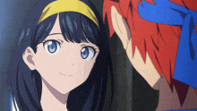 a girl with blue eyes and a yellow headband is looking at a boy with red hair