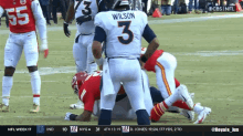 a football player wearing the number 3 jersey