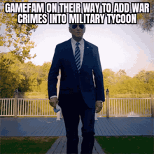 a man in a suit and tie is walking down a path with a caption that reads gamefam on their way
