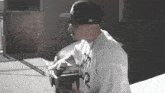 a man wearing a hat and a shirt that says ' chicago '