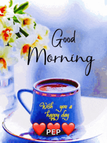 a cup of coffee on a saucer with the words good morning wish you a happy day