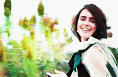 lily-collins-wave.gif