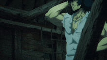a man with a beard and long black hair is standing in a dark room