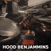a man in a hood benjamins costume holds an american flag in a garage