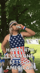 a man in an american flag outfit is drinking from a can and says happy 4th everyone lets go america