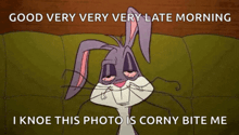 a cartoon of bugs bunny laying on a green couch