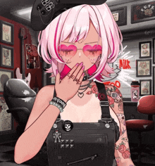 a girl with a bracelet that says boobie