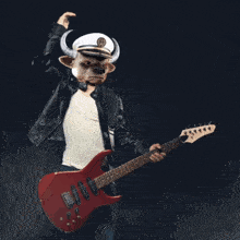 a man with a bull mask playing a guitar