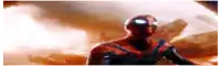 a close up of a person in a spiderman costume standing in front of a cloudy sky .