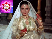 a woman in a white dress is standing in front of a logo that says ' marathi ' on it
