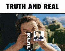 a man with a beard is holding a picture of a man and the words truth and real above him