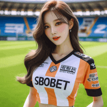 a woman wearing a soccer jersey that says sbobet on it