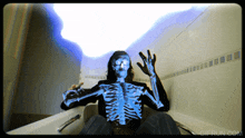 a man in a bathtub with a skeleton on his body
