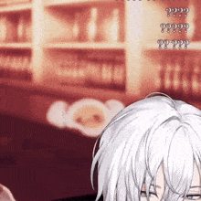 a close up of a person 's face with a blurred background that says ' ? ? ? ' on it