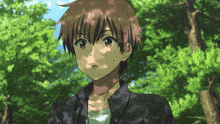 a boy with brown hair is standing in front of a forest