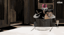 a man sitting at a table reading a book titled bat fancy