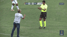 a soccer game between nau and tre is being shown on live fc