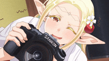 a cartoon character is holding a camera that says sankon on it