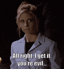 a woman in a white jacket says all right i get it you 're evil