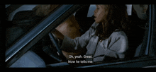 a woman is driving a car and says " oh yeah great "