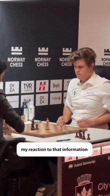 a man playing a game of norway chess in front of a sign that says norway chess