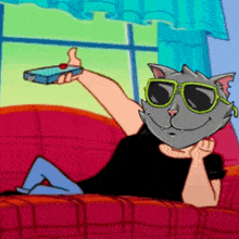 a cartoon cat with sunglasses is laying on a couch holding a remote