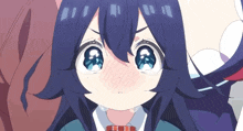 a close up of a girl 's face with tears running down her cheeks