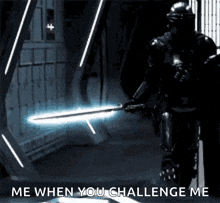 a robot is holding a light saber and says me when you challenge me .