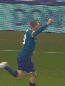 two soccer players one with the number 2 on