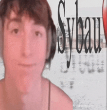 a close up of a person 's face with the word sybau written in the background