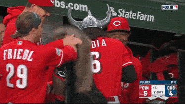 Reds' Jonathan India looks his best in a Viking helmet and at plate