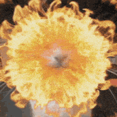 a close up of a large explosion of fire