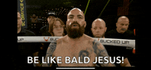a man in a boxing ring with the words be like bald jesus