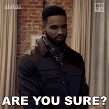 a man wearing a leather jacket is asking if he is sure