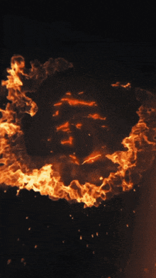 a poster with a circle of fire and the word yagiz